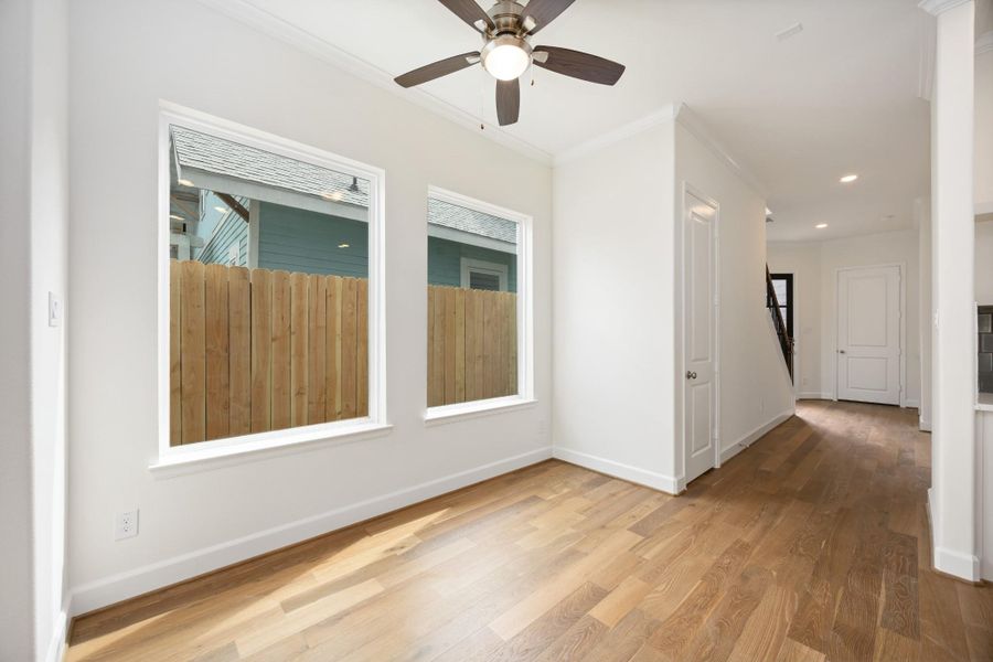 Your dining area is perfectly tucked away—intimate enough for dinner for two, open enough to feel part of the flow. Large windows let the sunshine pour in.