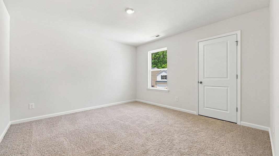 Spacious, unfurnished interior of a new home in Carter Ridge, Greenville (Image 34).