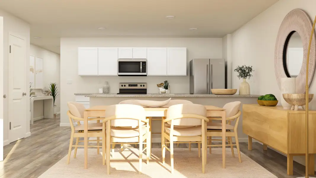 A kitchen with a dining table and chairs. A kitchen with a dining table and chairs.