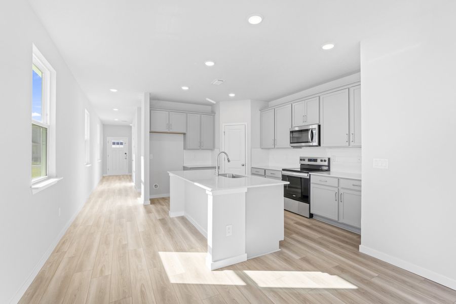 Lot 145 Kitchen with Gray Cabinets at Camden Woods in Kingsland