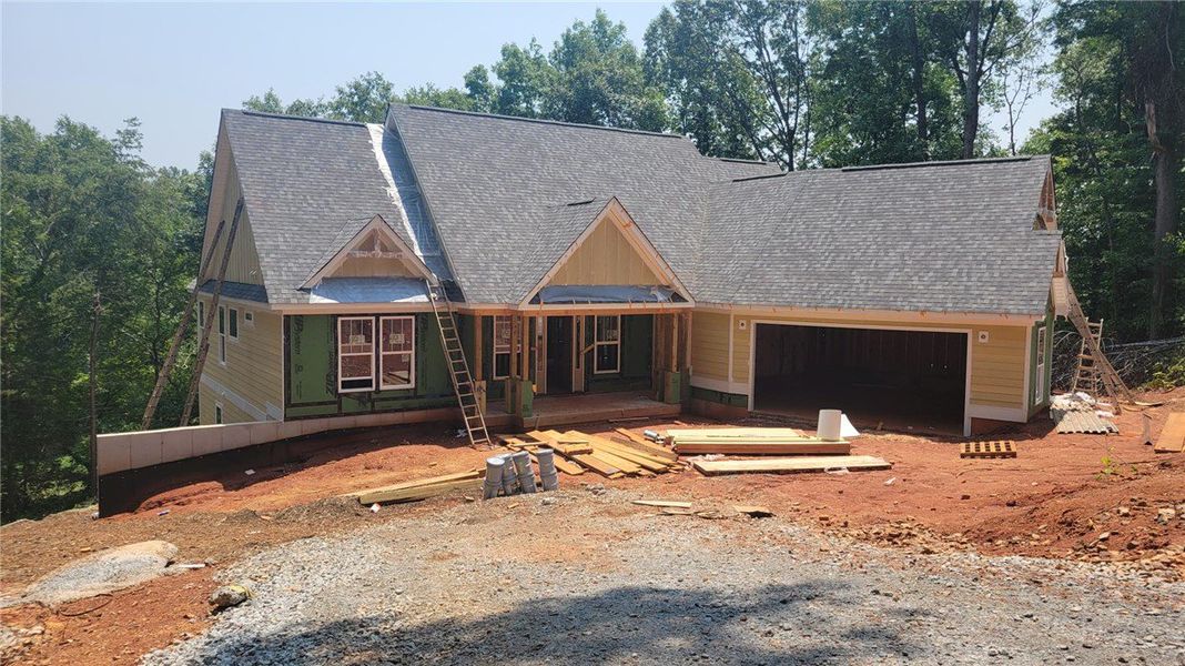A newly constructed home, nestled amidst mature tr A newly constructed home, nestled amidst mature tr