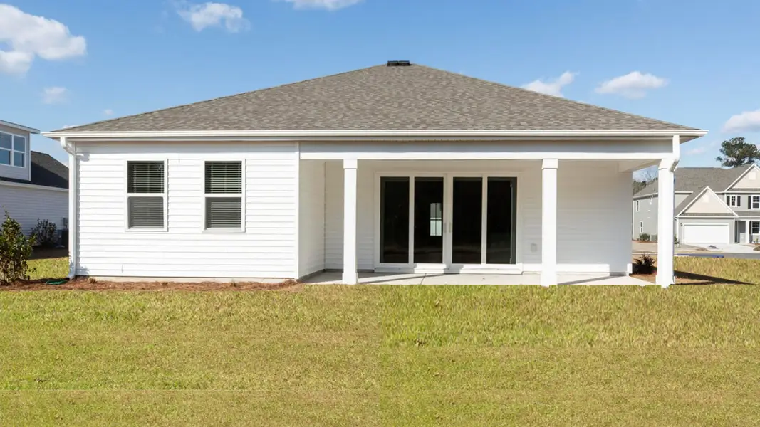 Exterior details and patio area of a home in Grayson Park, Leland (Image 3).