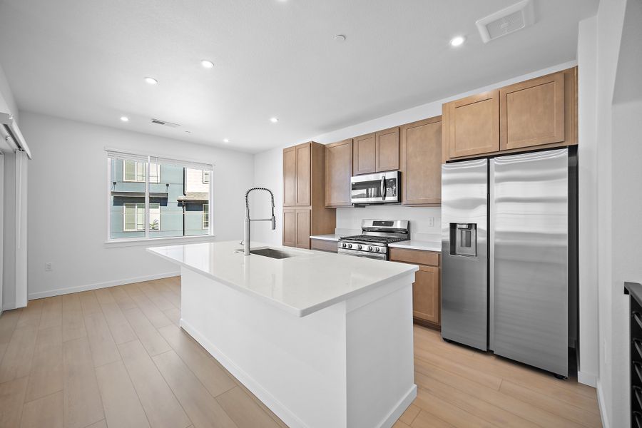 Furnished interior view inside a new home in Lyric at RidgeGate Townhomes, Lone Tree (Image 4).