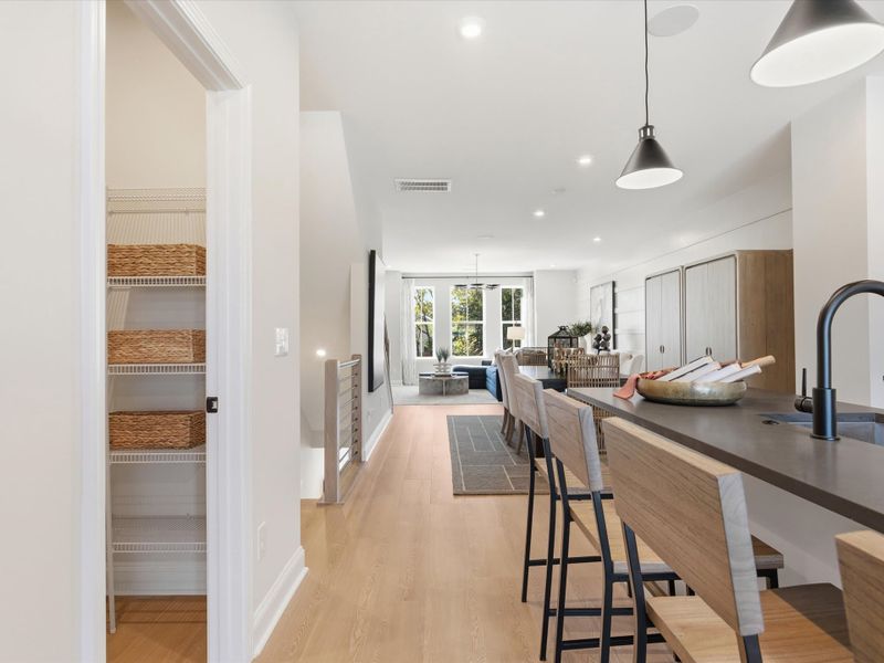 Representative furnished interior of a home built from the Dahlia by Tri Pointe Homes in Bellflower, Charlotte (Image 18).