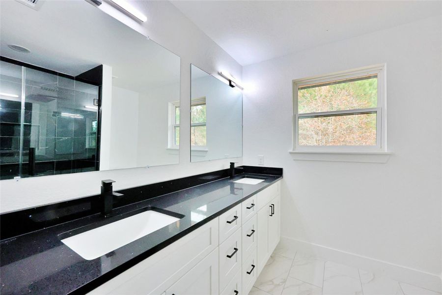 Primary bath with dual vanities!