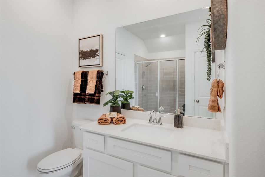 Furnished interior view inside a new home in Bridgeland, Cypress (Image 29).