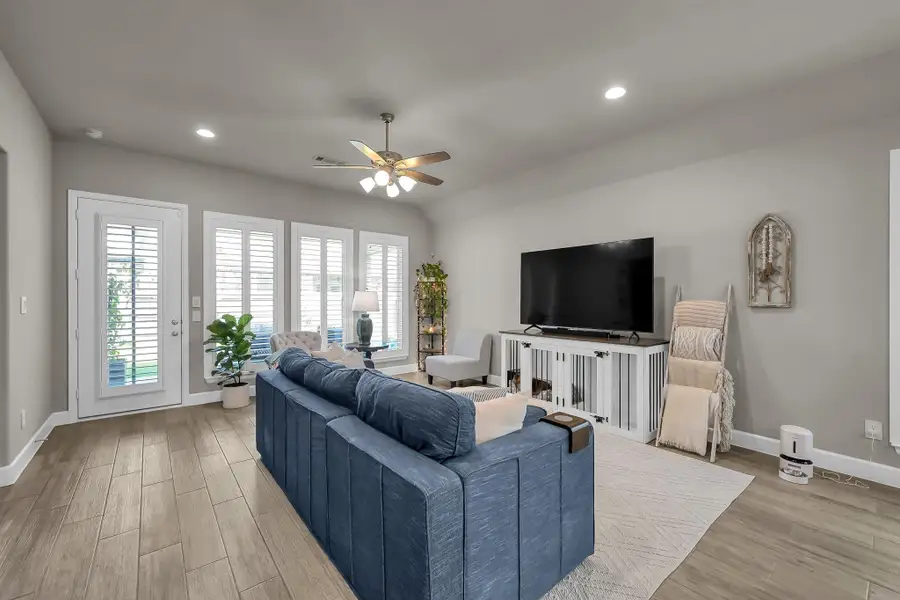 Furnished interior view inside a new home in Grand Central Park 45', Conroe (Image 9).