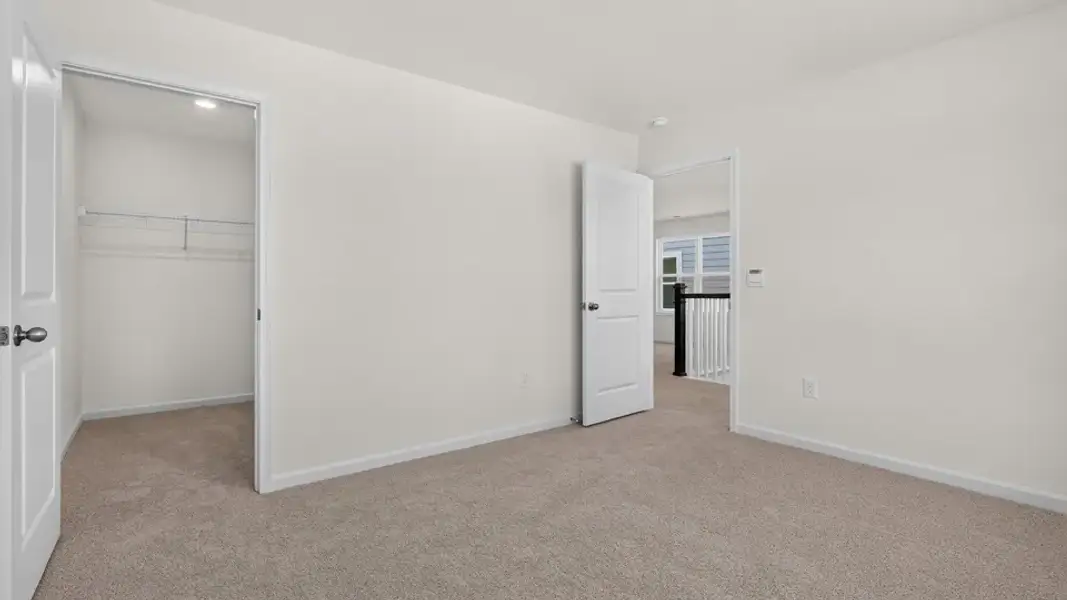 Spacious, unfurnished interior of a new home in Madden West, Fuquay Varina (Image 28).