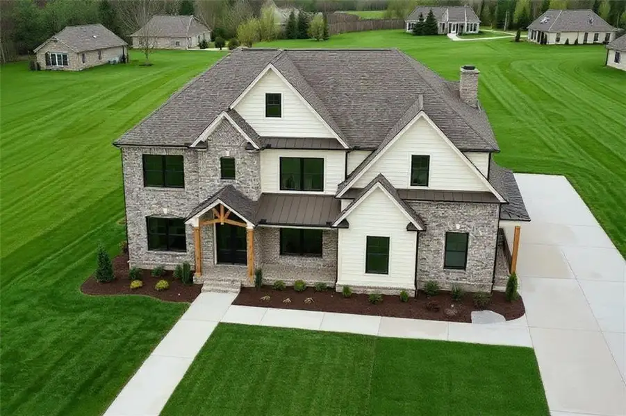 Front exterior of a new home in , Buford, GA, highlighting curb appeal (Image 2). Front exterior of a new home in , Buford, GA, highlighting curb appeal (Image 2).