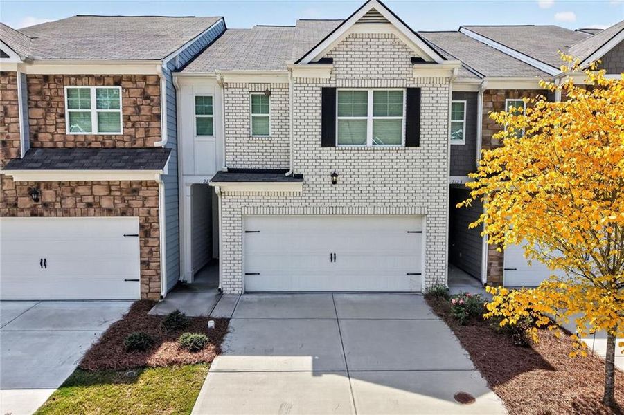 Front exterior of a new home in , Buford, GA, highlighting curb appeal (Image 1). Front exterior of a new home in , Buford, GA, highlighting curb appeal (Image 1).