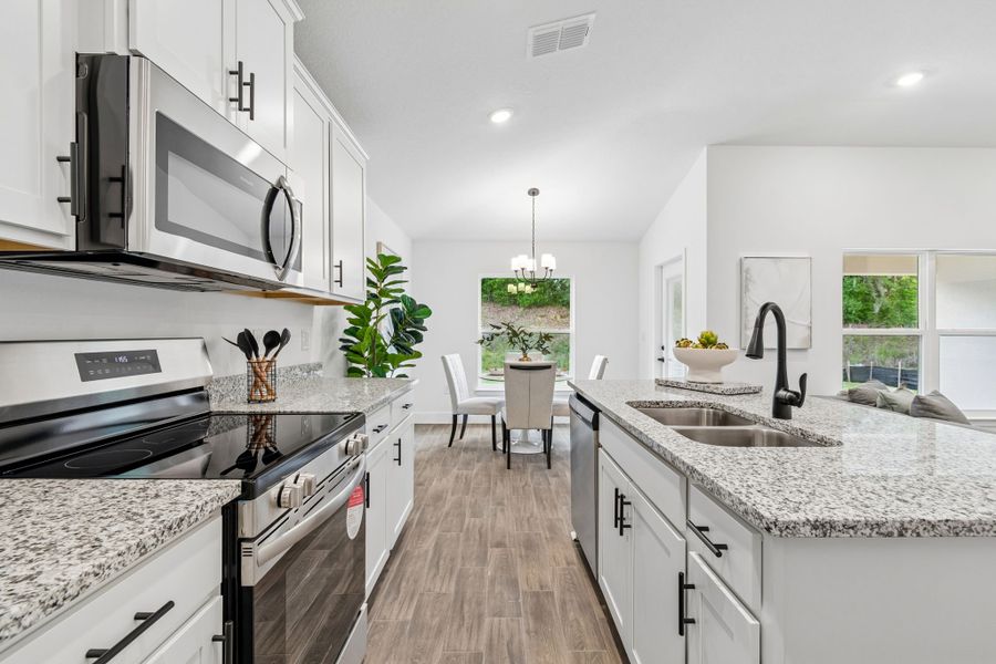 Furnished interior view inside a new home in Abbey Glen, Dade City (Image 16).