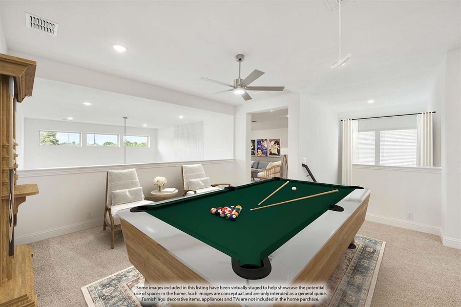 Game room with pool table, ceiling fan, carpet flooring, and seating area along the wall