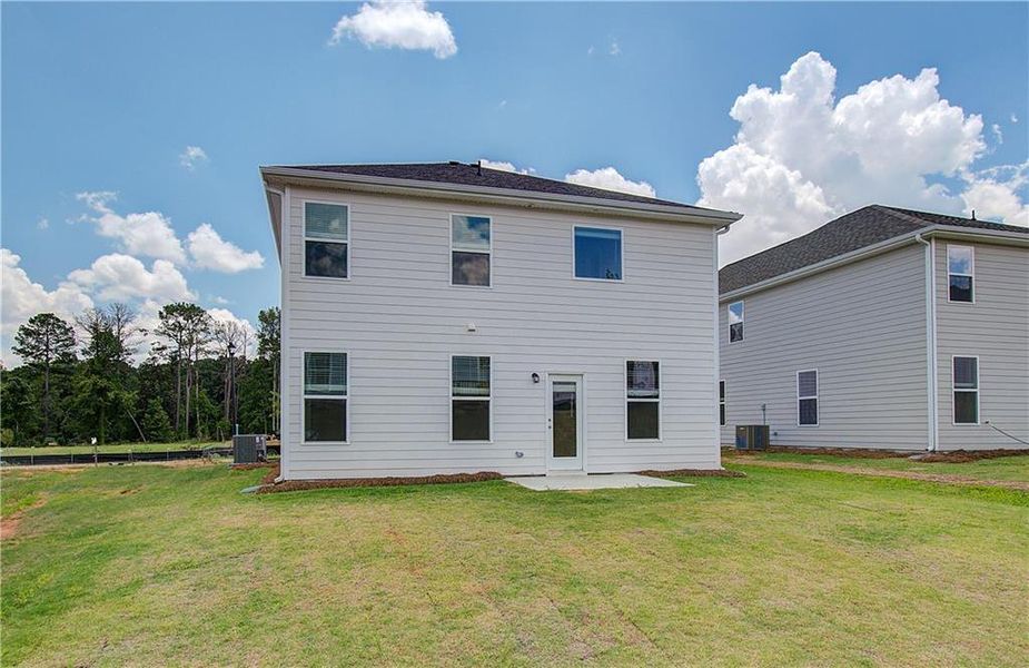 Exterior details and patio area of a home in Enclave at Evergreen, Fairburn (Image 3). Exterior details and patio area of a home in Enclave at Evergreen, Fairburn (Image 3).