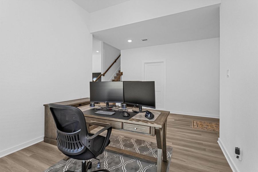 This additional view of the room highlights its open layout and flexible design.