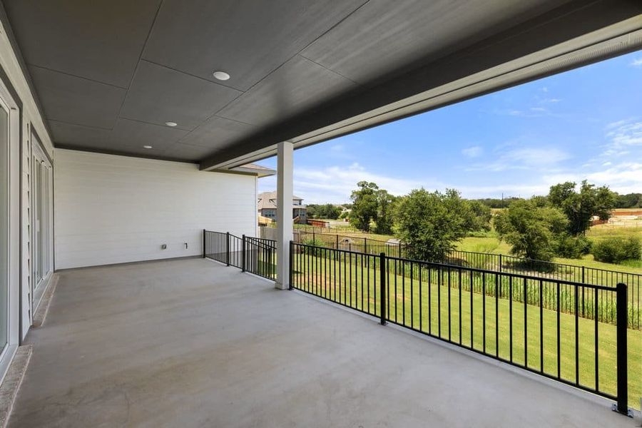 Exterior details and patio area of a home in Lariat, Liberty Hill (Image 29).