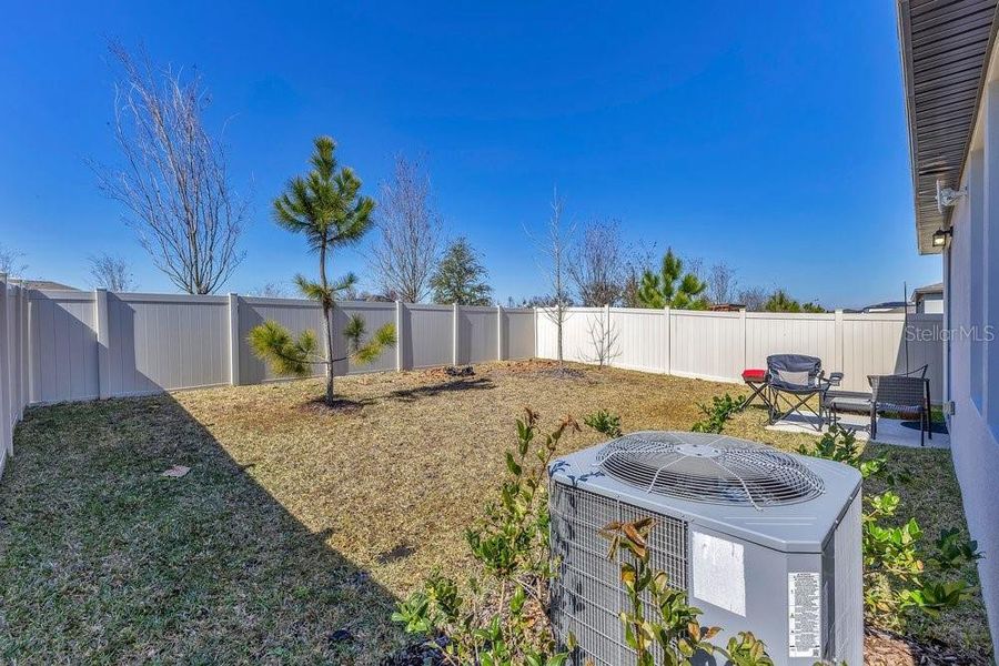 Exterior details and patio area of a home in Park East, Plant City (Image 23).