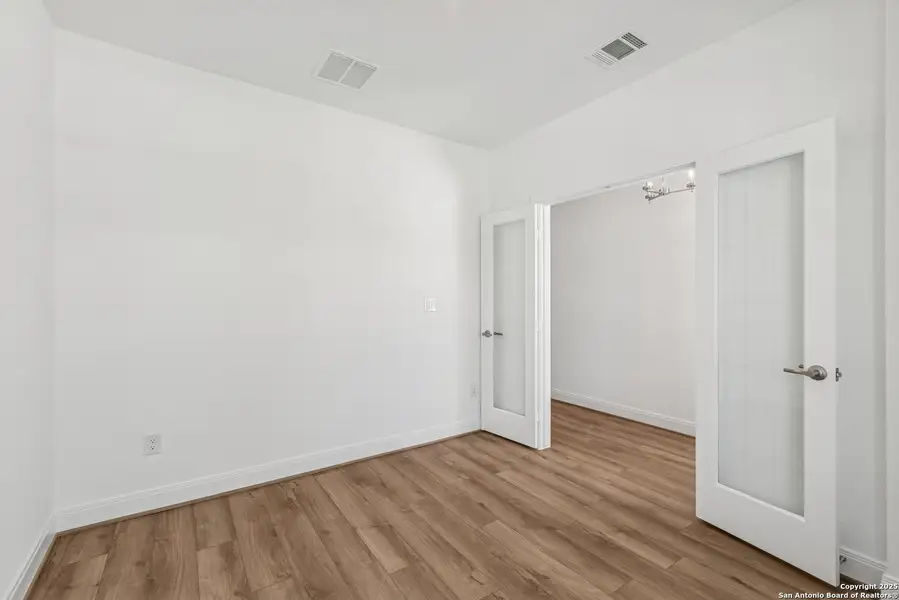 Spacious, unfurnished interior of a new home in Ladera - High Point 45', San Antonio (Image 9). Spacious, unfurnished interior of a new home in Ladera - High Point 45', San Antonio (Image 9).