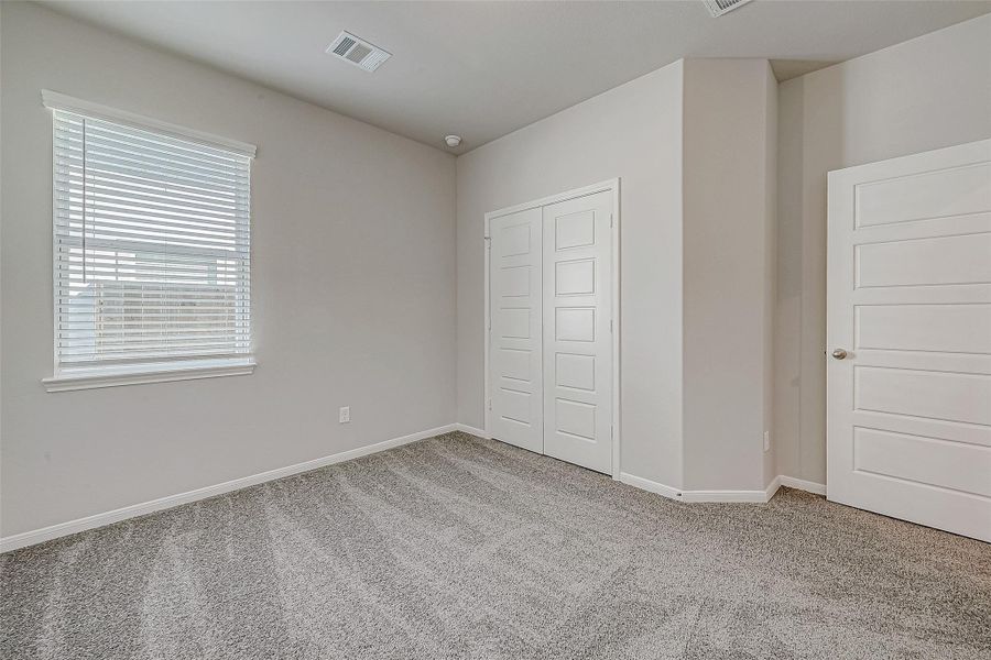 Spacious, unfurnished interior of a new home in Mill Creek Trails, Magnolia (Image 21).