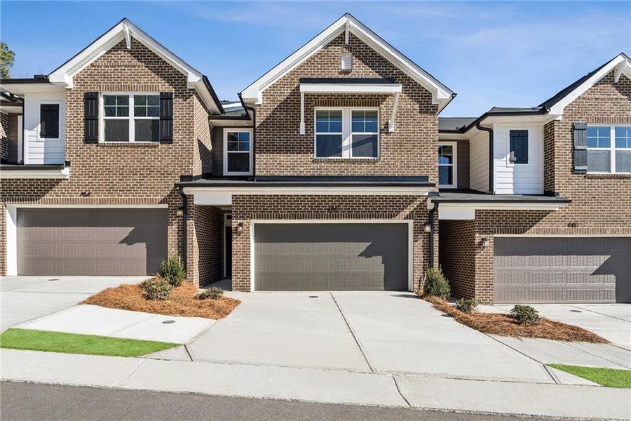 Front exterior of a new home in Grandview Terrace, Canton, GA, highlighting curb appeal (Image 1). Front exterior of a new home in Grandview Terrace, Canton, GA, highlighting curb appeal (Image 1).