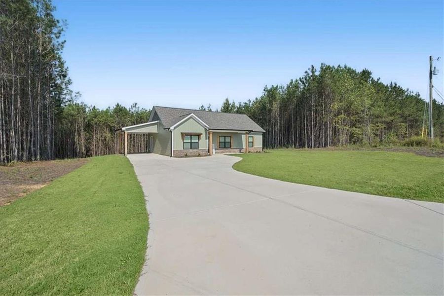 Front exterior of a new home in , Tallapoosa, GA, highlighting curb appeal (Image 21).