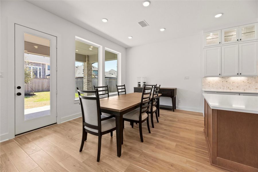 Furnished interior view inside a new home in Bridgeland, Cypress (Image 7).