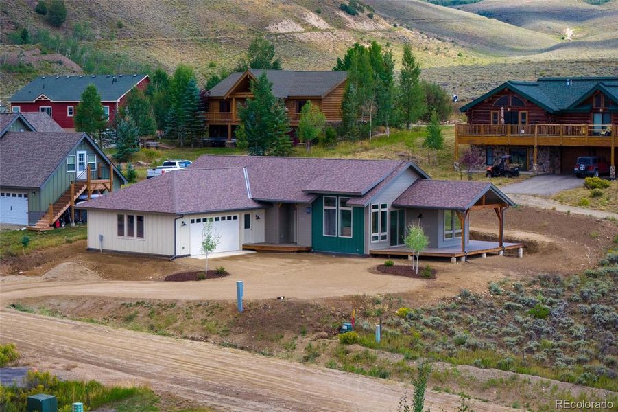 Front exterior of a new home in , Hot Sulphur Springs, CO, highlighting curb appeal (Image 21).