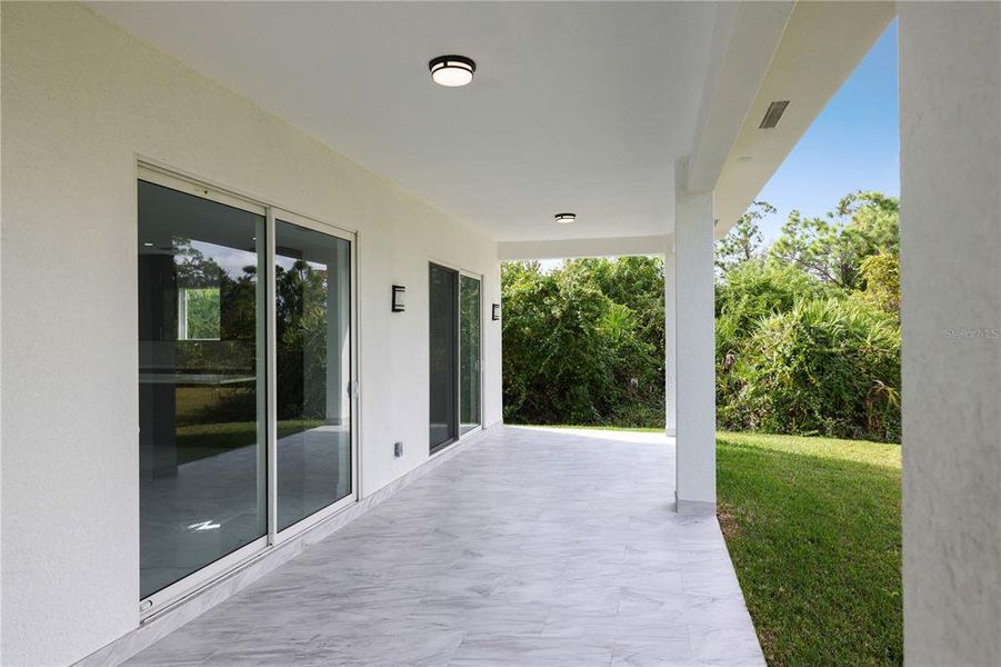 Exterior details and patio area of a home in , Rotonda West (Image 23).