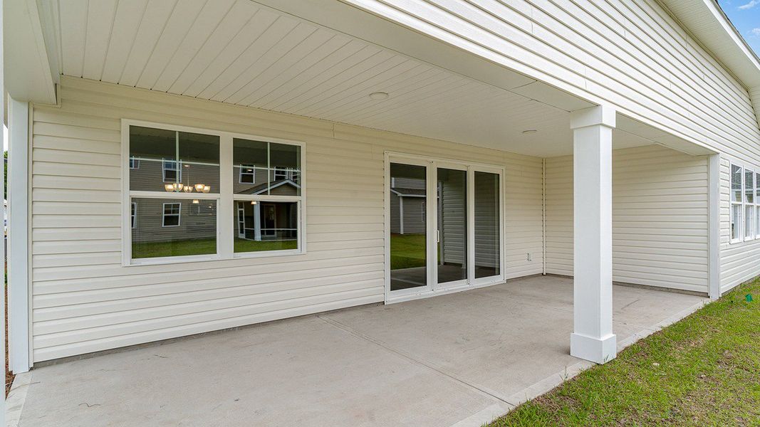 Representative exterior photo of a completed home built from the EATON by D.R. Horton in Heron Pointe, Myrtle Beach, SC (Image 22).
