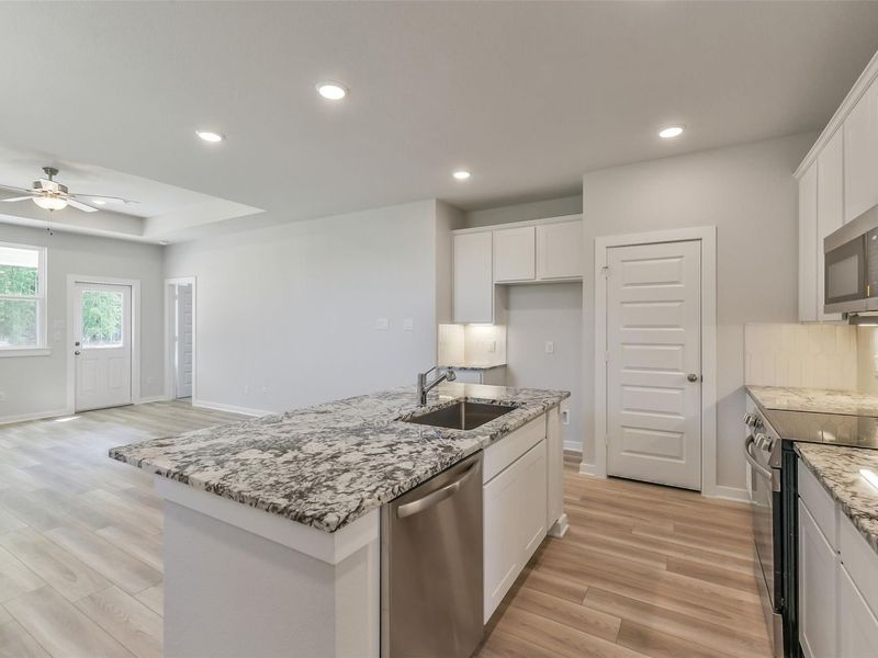 Furnished interior view inside a new home in Spring Branch Crossing, Conroe (Image 15).