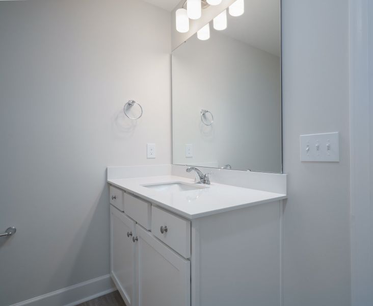 Representative furnished interior of a home built from the The Kennedy by Cothran Homes in Holly Ridge, Greenville (Image 32).