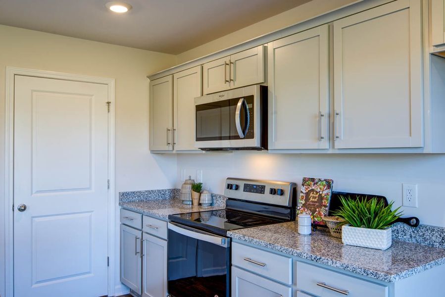 Representative furnished interior of a home built from the Penwell by D.R. Horton in Carter Ridge, Greenville (Image 17).