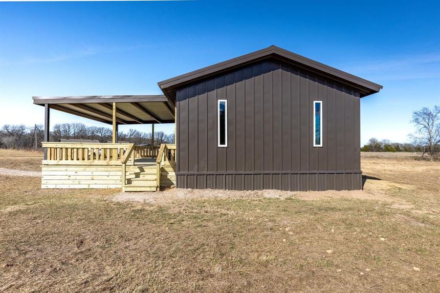 Exterior details and patio area of a home in , Point (Image 11).