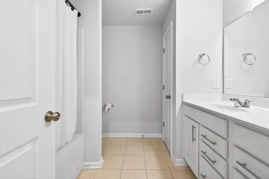 Furnished interior view inside a new home in Reunion, Flowery Branch (Image 6).