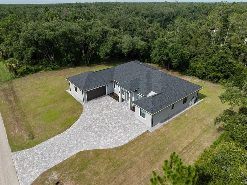 Front exterior of a new home in , Port Charlotte, FL, highlighting curb appeal (Image 22). Front exterior of a new home in , Port Charlotte, FL, highlighting curb appeal (Image 22).