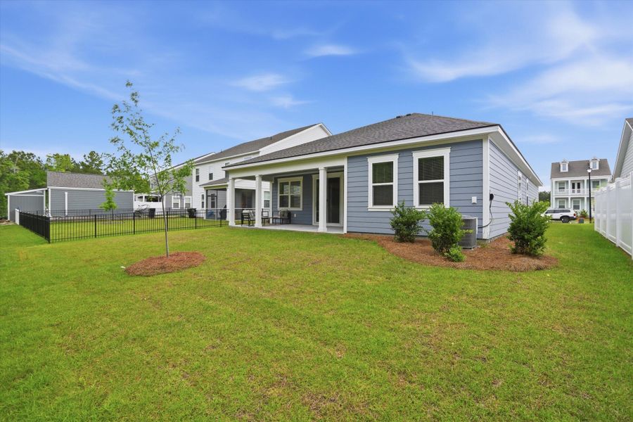 Exterior details and patio area of a home in Sheep Island, Summerville (Image 24).