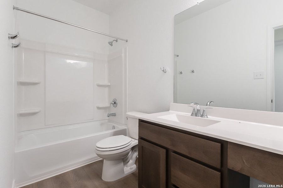 Furnished interior view inside a new home in Hidden Bluffs at TRP, San Antonio (Image 6).