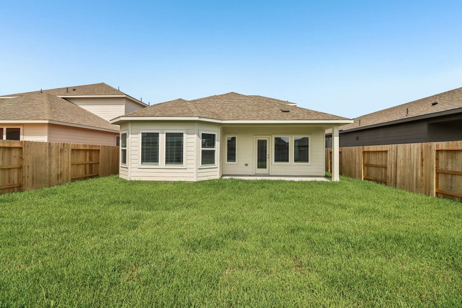 Exterior details and patio area of a home in Riviera Pines - Premier Series, Huffman (Image 3). Exterior details and patio area of a home in Riviera Pines - Premier Series, Huffman (Image 3).