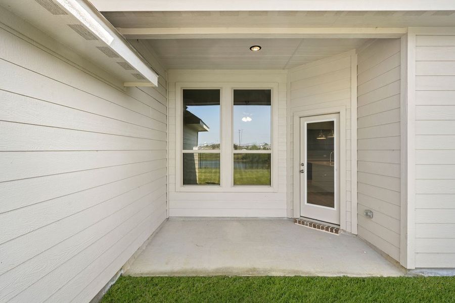 Front exterior of a new home in Still Water Lake, Godley, TX, highlighting curb appeal (Image 18). Front exterior of a new home in Still Water Lake, Godley, TX, highlighting curb appeal (Image 18).