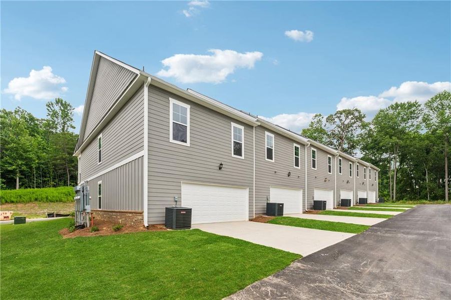 Front exterior of a new home in , Gainesville, GA, highlighting curb appeal (Image 38). Front exterior of a new home in , Gainesville, GA, highlighting curb appeal (Image 38).