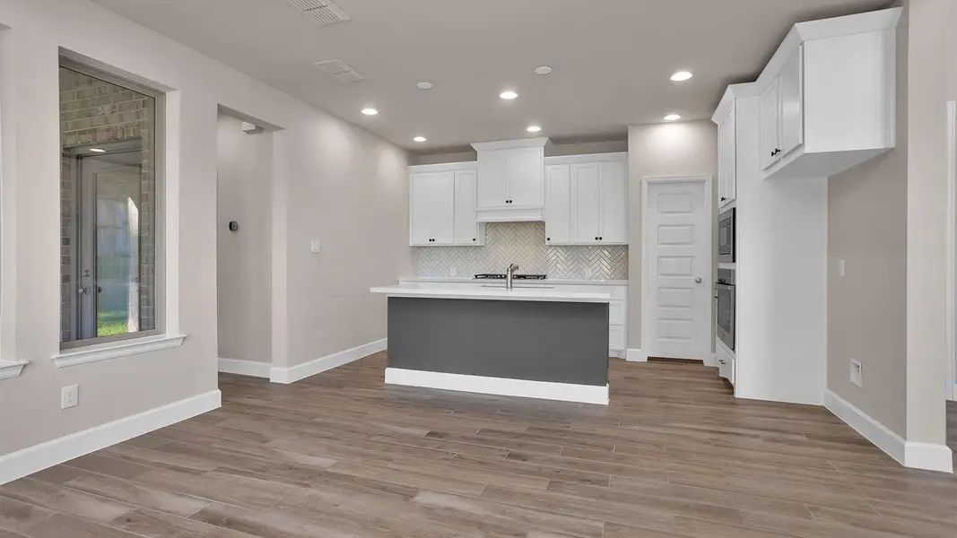 Furnished interior view inside a new home in The Woodlands Hills 40', Willis (Image 4).