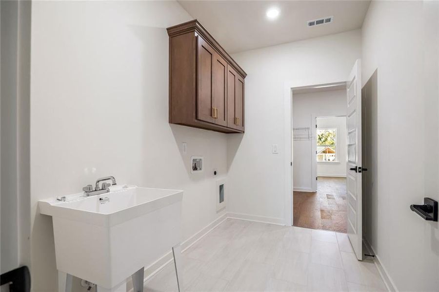 Furnished interior view inside a new home in Long Hollow Landing, Gainesville (Image 16).