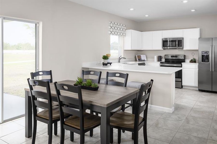 Representative furnished interior of a home built from the Willow by Ryan Homes in Vista Trace, Belleview (Image 5).