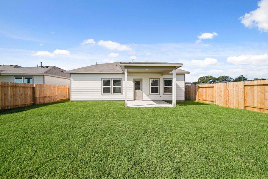 Exterior details and patio area of a home in Russell Ranch, Bay City (Image 3).