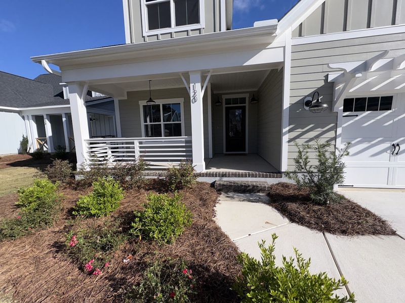 Exterior details and patio area of a home in Riverside Cove, Wilmington (Image 2).
