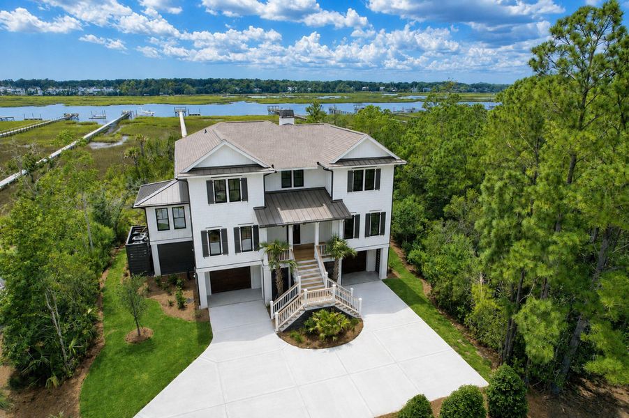 Front exterior of a new home in , Awendaw, SC, highlighting curb appeal (Image 14).