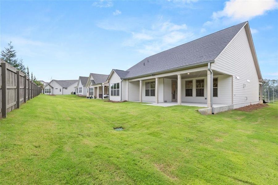 Exterior details and patio area of a home in Soleil Summit Chase, Snellville (Image 31).