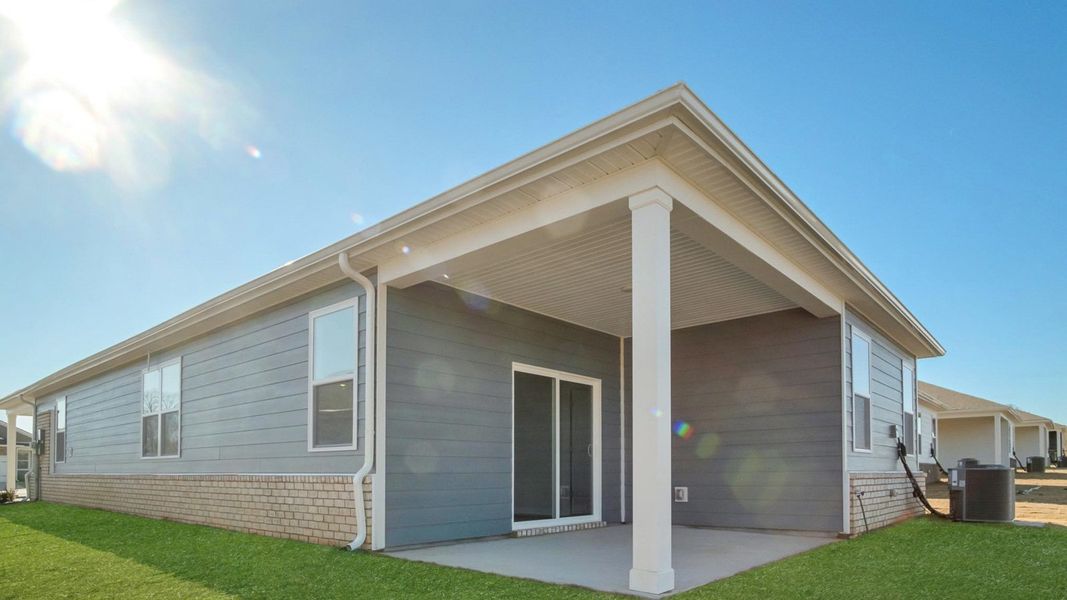 Exterior details and patio area of a home in Legacy Farms, White House (Image 4).