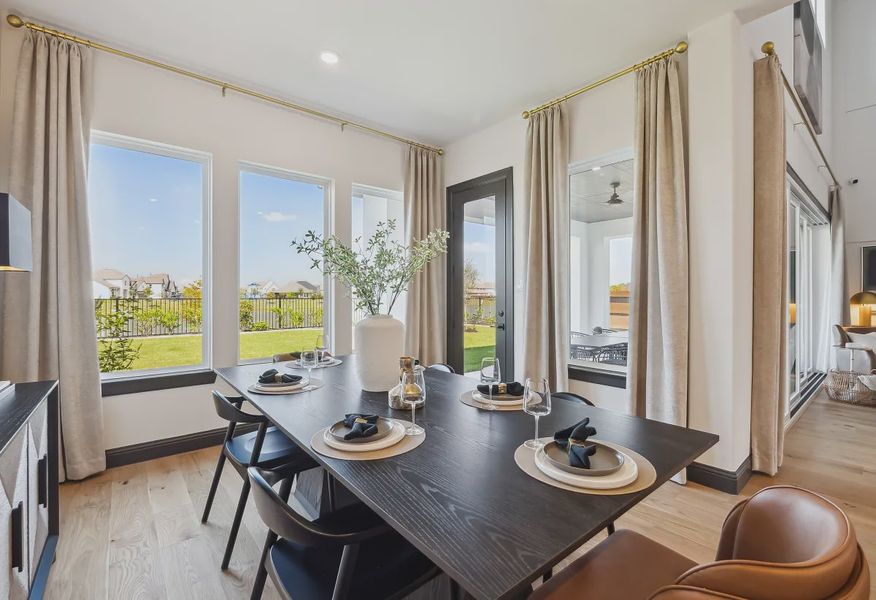 Plan 5058 dining - staged - 7 of 25 Plan 5058 dining - staged - 7 of 25