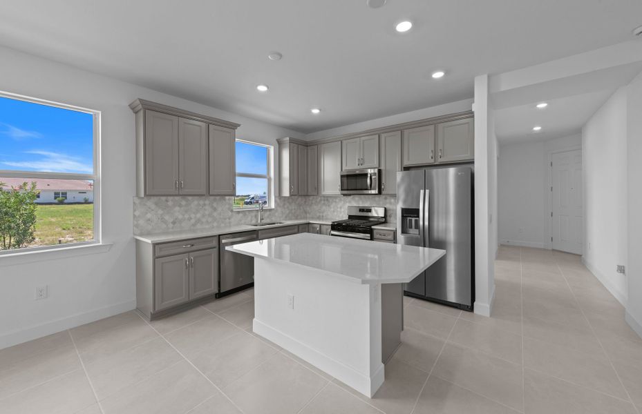 Furnished interior view inside a new home in TerraWalk at Babcock Ranch, Alva (Image 6).