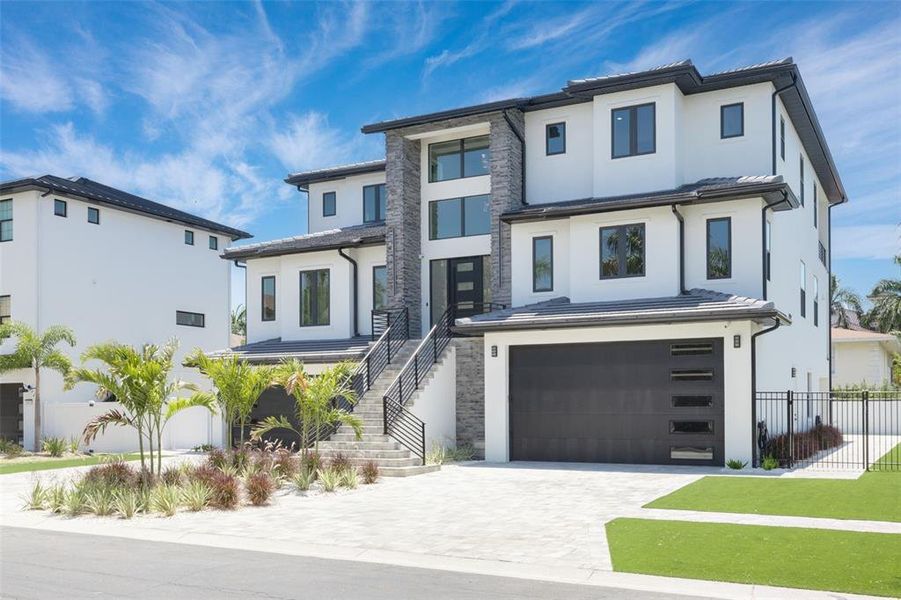 Front exterior of a new home in , Gulfport, FL, highlighting curb appeal (Image 29). Front exterior of a new home in , Gulfport, FL, highlighting curb appeal (Image 29).